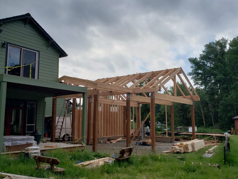 Addition roof framing tie-in to main house by ArchAngel Construction Services