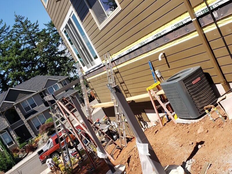Concrete pier footings poured for deck support posts
