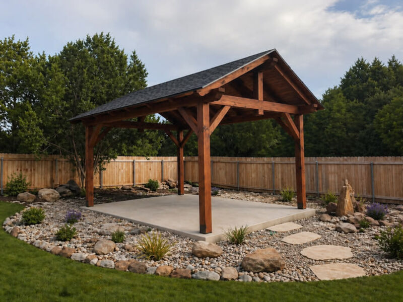 Freestanding backyard pavilion with concrete pad by ArchAngel Construction Services